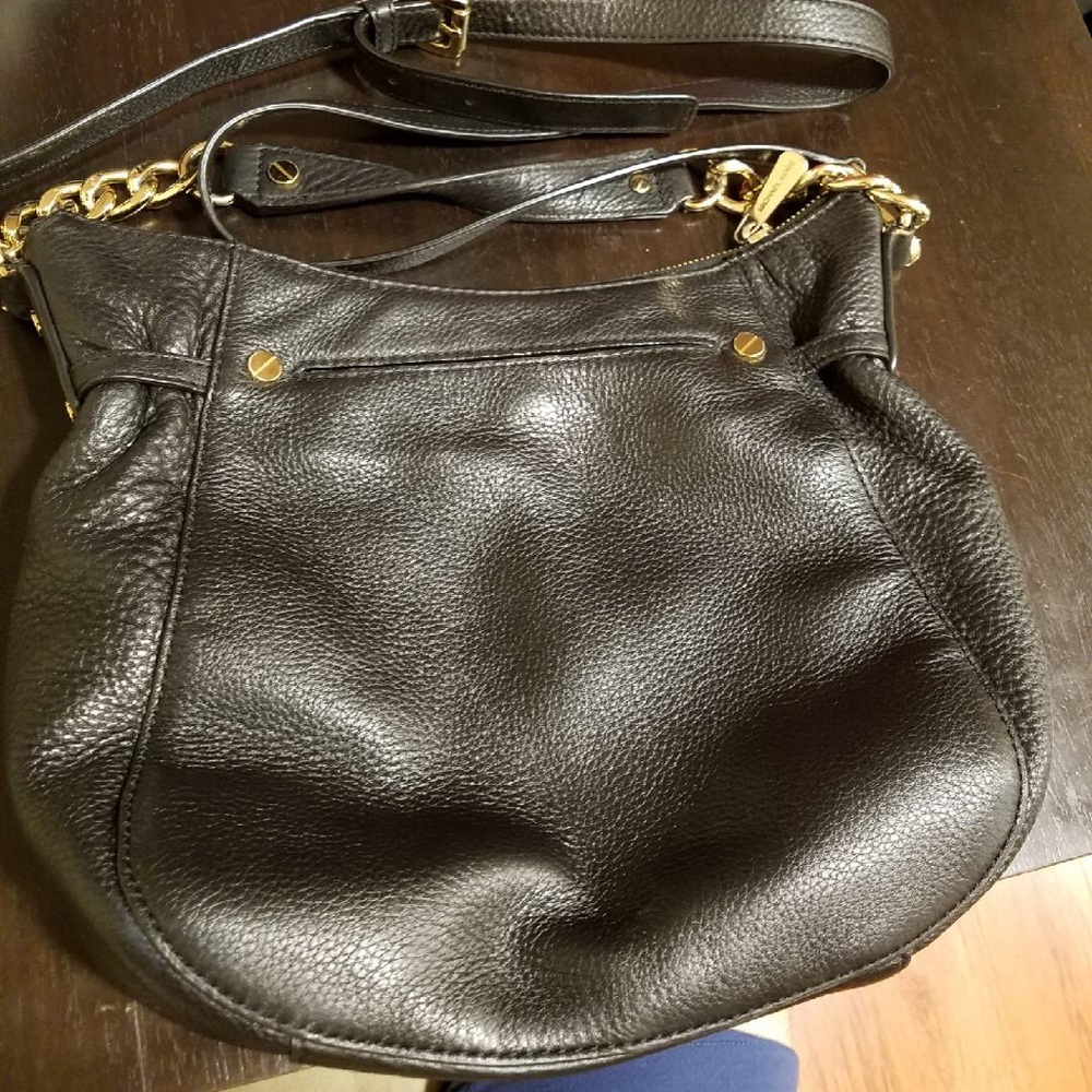 Authentic MK purse with shoulder and cross body